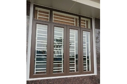 Mẫu cửa sổ thép vân gỗ đẹp phù hợp lắp đặt cho chung cư